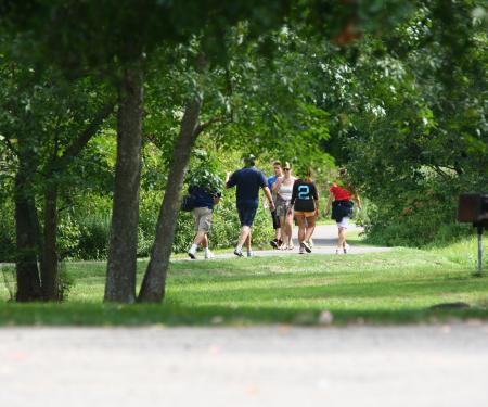 People exercising on a trail in Allegany State Park