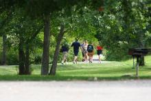 People exercising on a trail in Allegany State Park